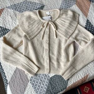 A Loves A. Peter Pan collar sweater